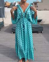 V-ringad klänning med modetryck